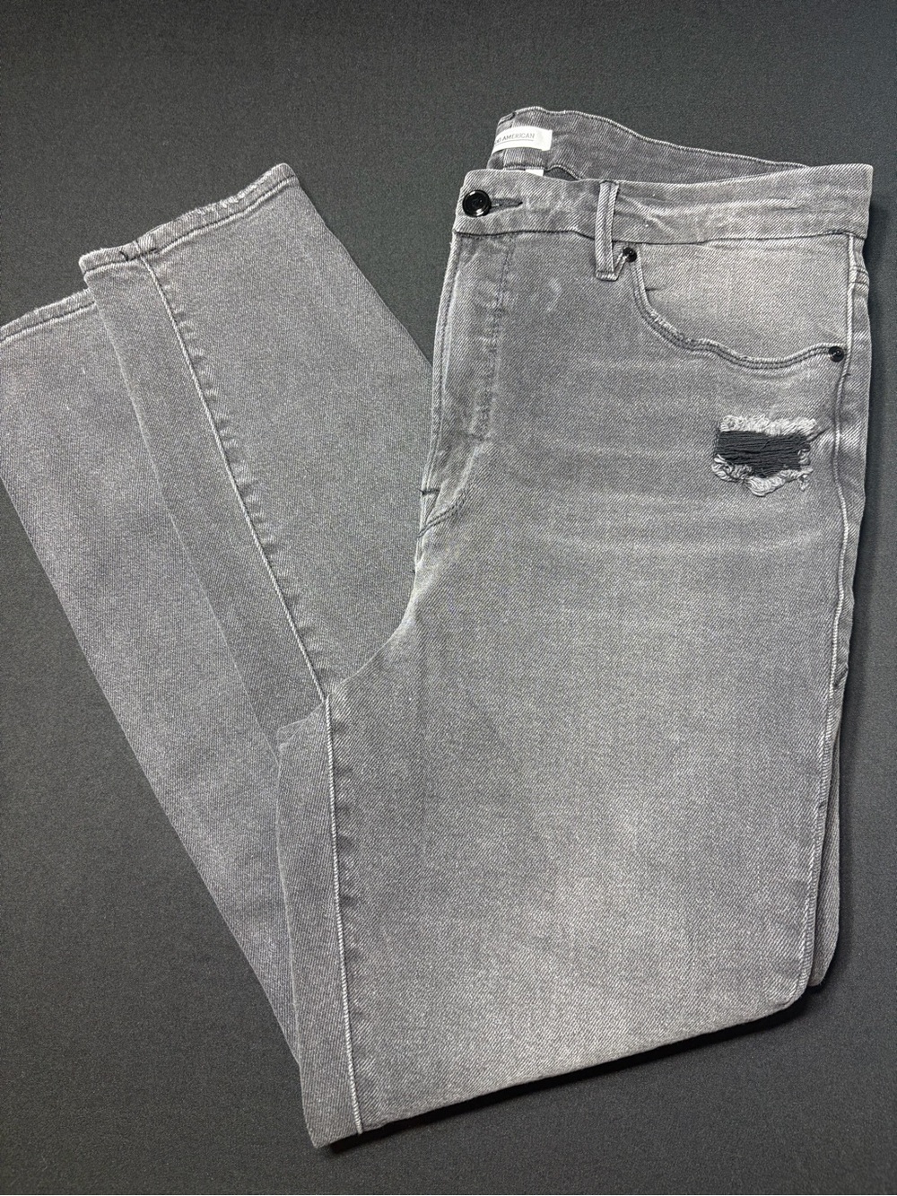 Good American black wash jeans size 16. Cheetah inside pocket detail!